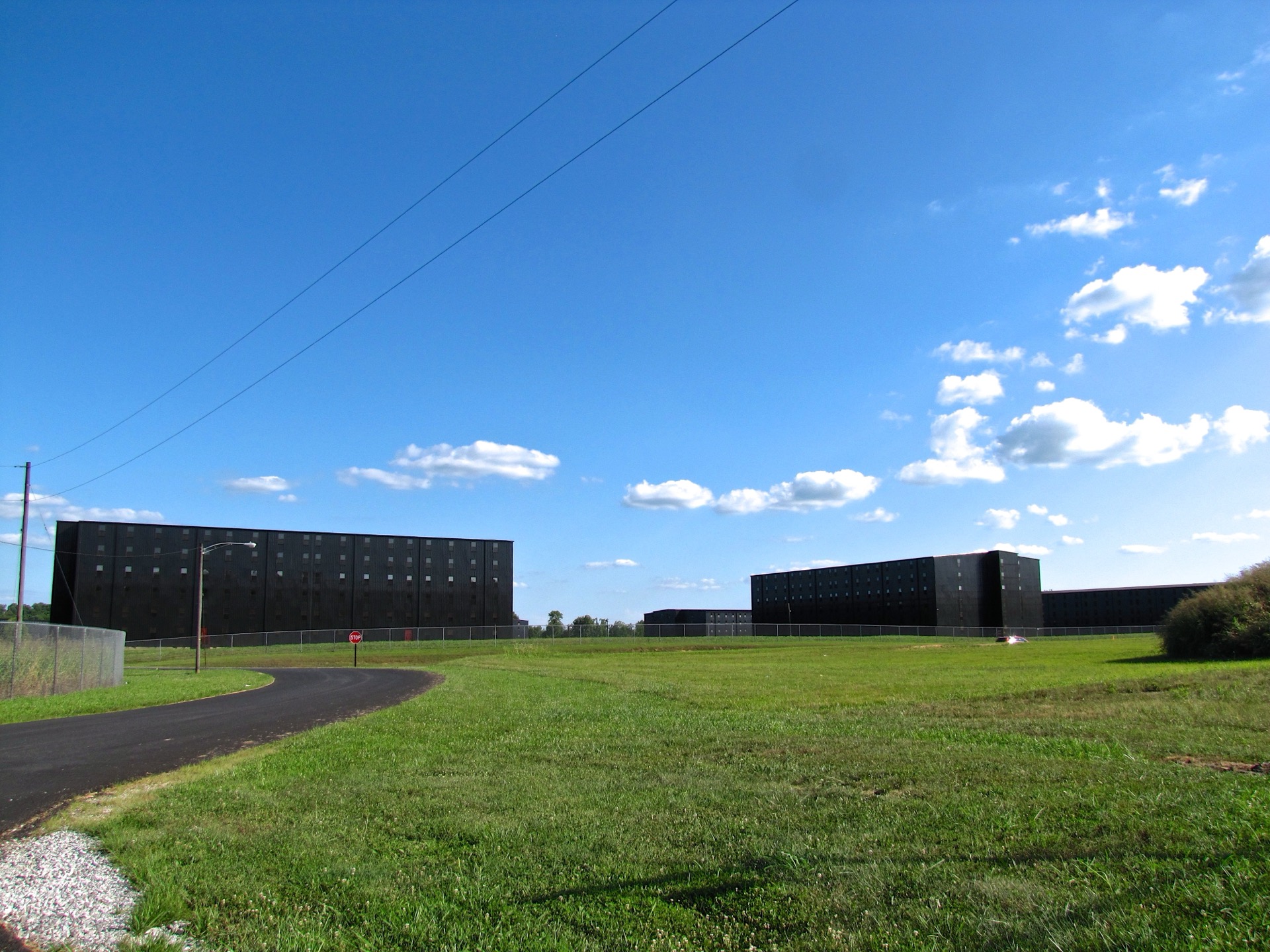 Whisky barrels aging in a traditional dunnage warehouse